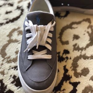 Gray and white men’s Ralph Lauren tennis shoes,